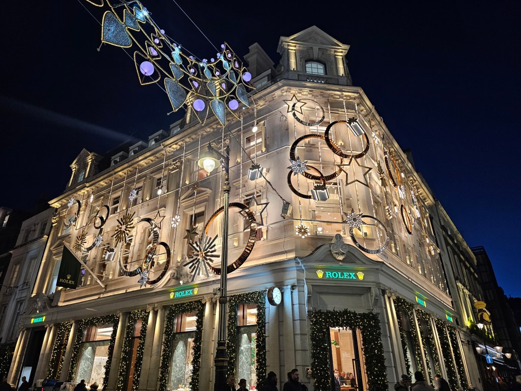 Luxury store Christmas street decorations on Bond Street, London