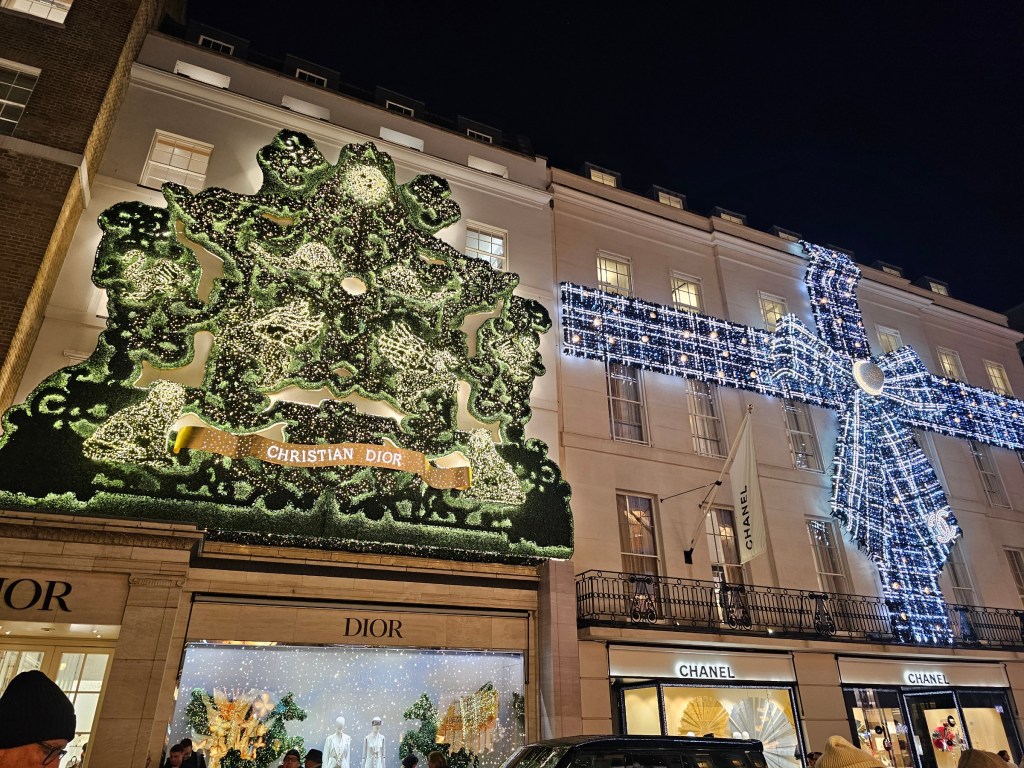 Luxury store Christmas street decorations on Bond Street, London