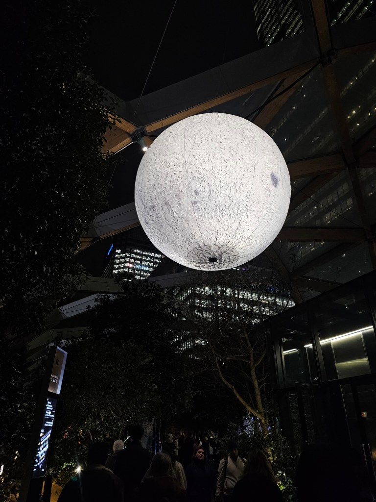 Large installation resembling the Moon, in the rooftop garden in Canary Wharf