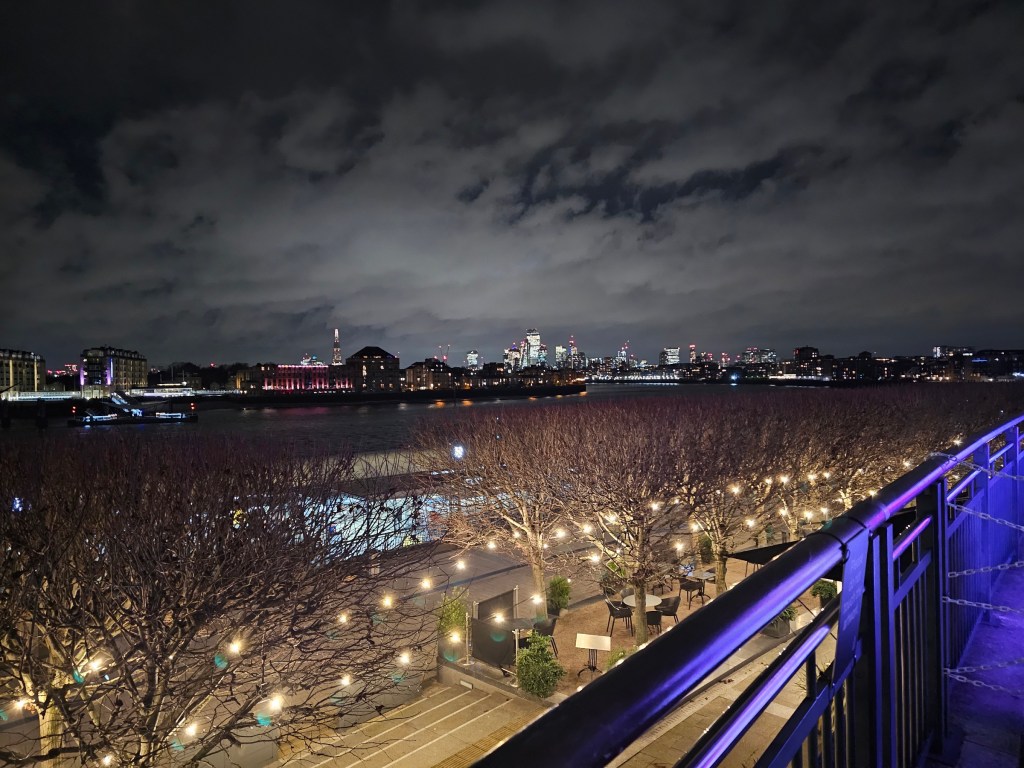 London City night panorama seen from Canary Wharf.