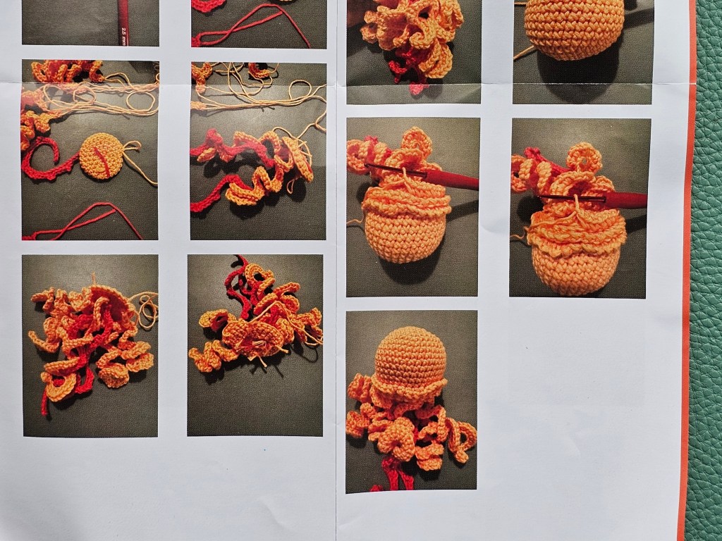 Close up photo of a leaflet with crochet instructions for making a small jellyfish