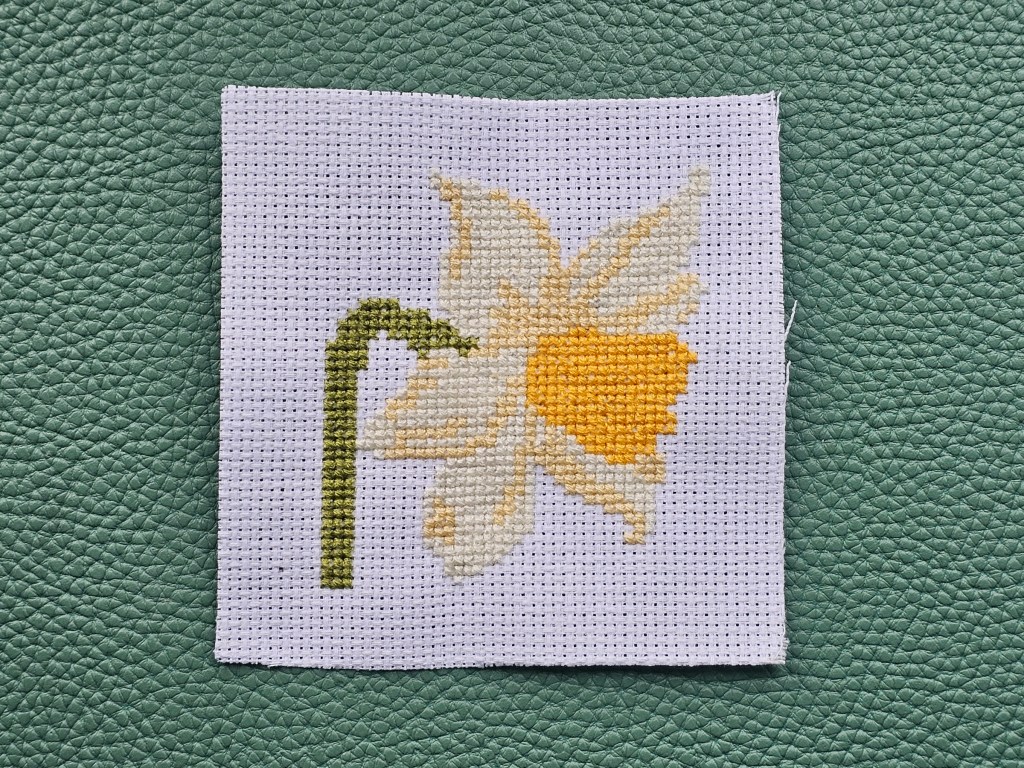 Nearly completed small cross stitched daffodil from an assorted kit