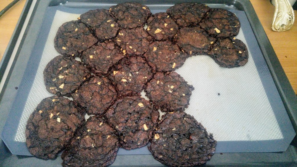 Failed chocolate cookies - in baking, they melted into a flat sheet covering the whole tray