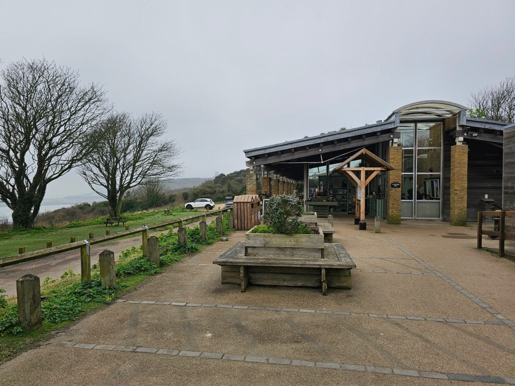 The Visitor Centre at the start of the White Cliffs of Dover. It's a large building with a car park in front of it.
