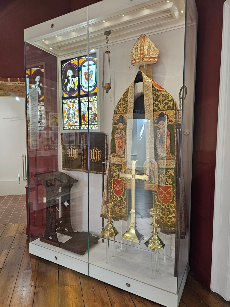 A display case with bishop's attire in Fulham Palace, London
