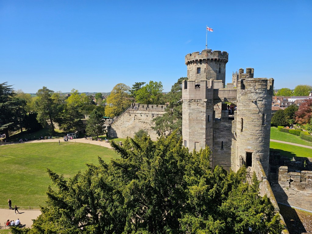 The view of the inner grounds of Warwick Castle. Photo taken from a tower.