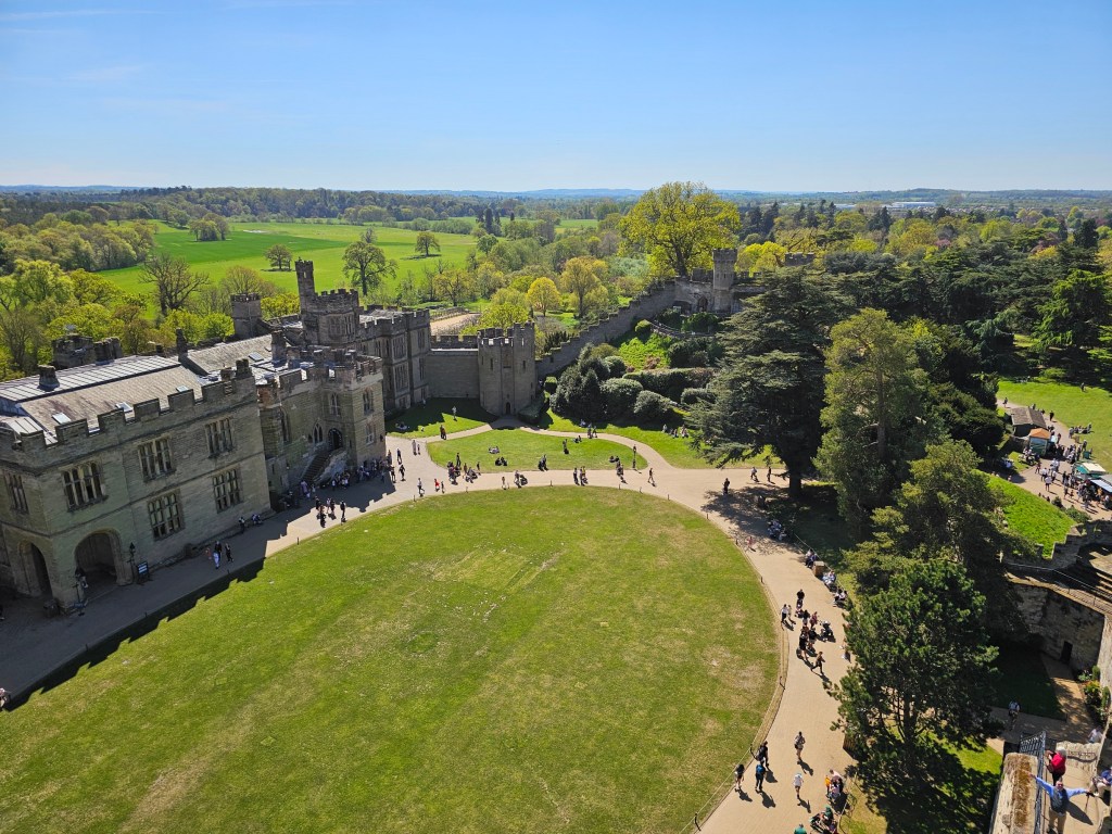 The view of the inner grounds of Warwick Castle. Photo taken from a tower.
