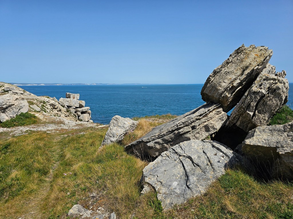 Rocky coastal path on the Isle of Portland, Dorset, UK