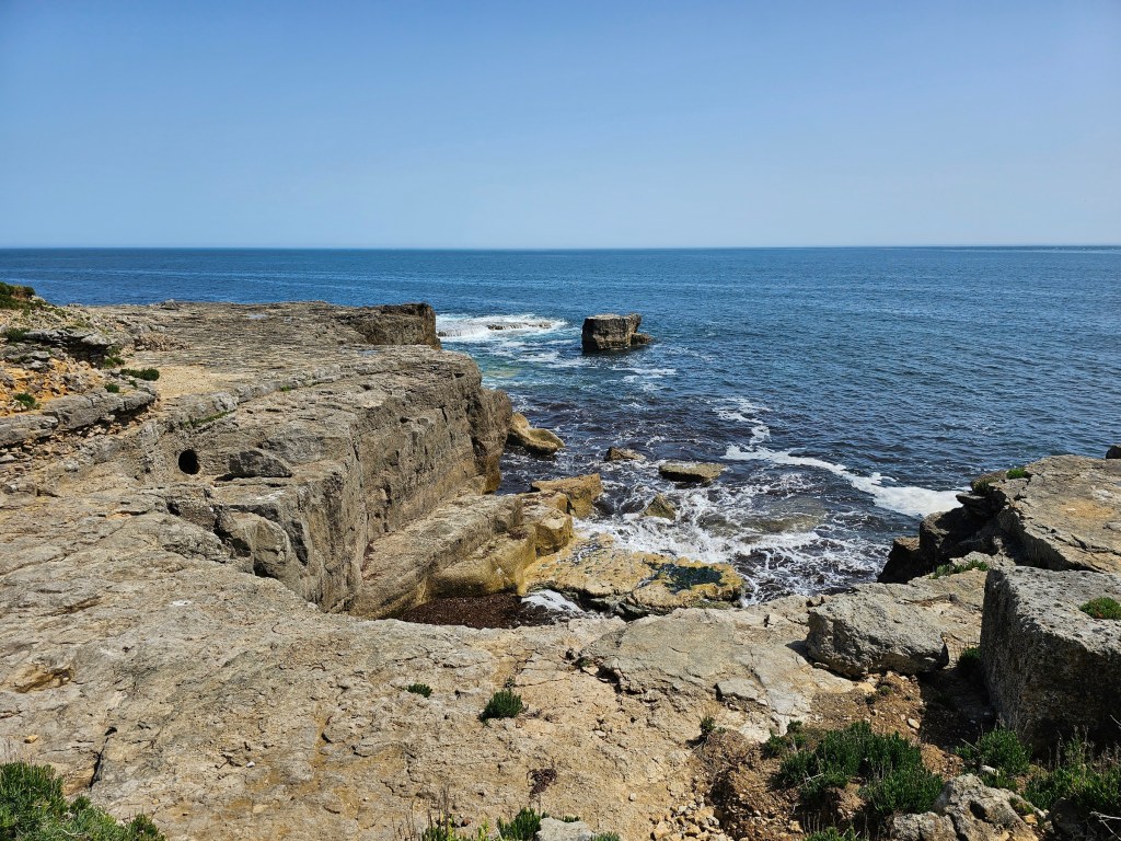 Rocky coastal path on the Isle of Portland, Dorset, UK