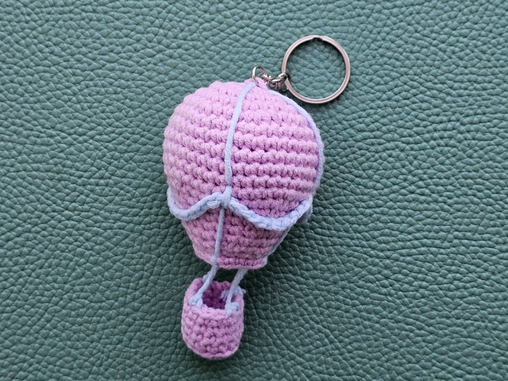 Finished crocheted hot air balloon key chain
