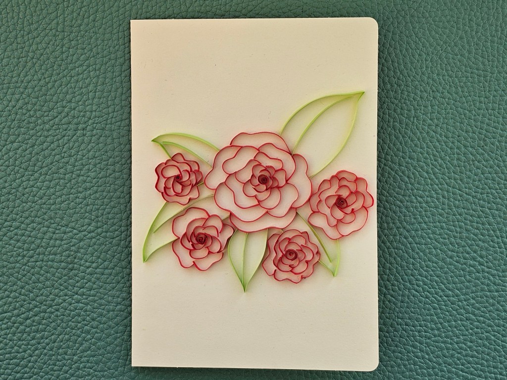 DIY Mother's Day card - a quilling line art design with 5 red roses and green leaves