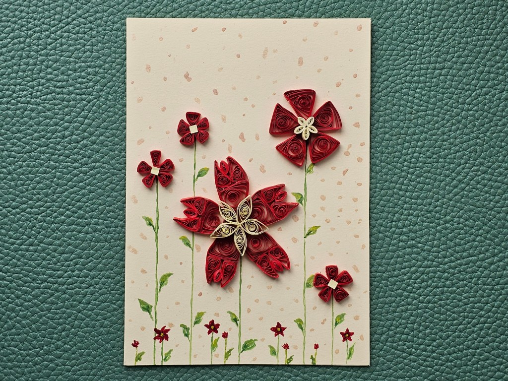 Handmade birthday card with red quilled poppies and painted details