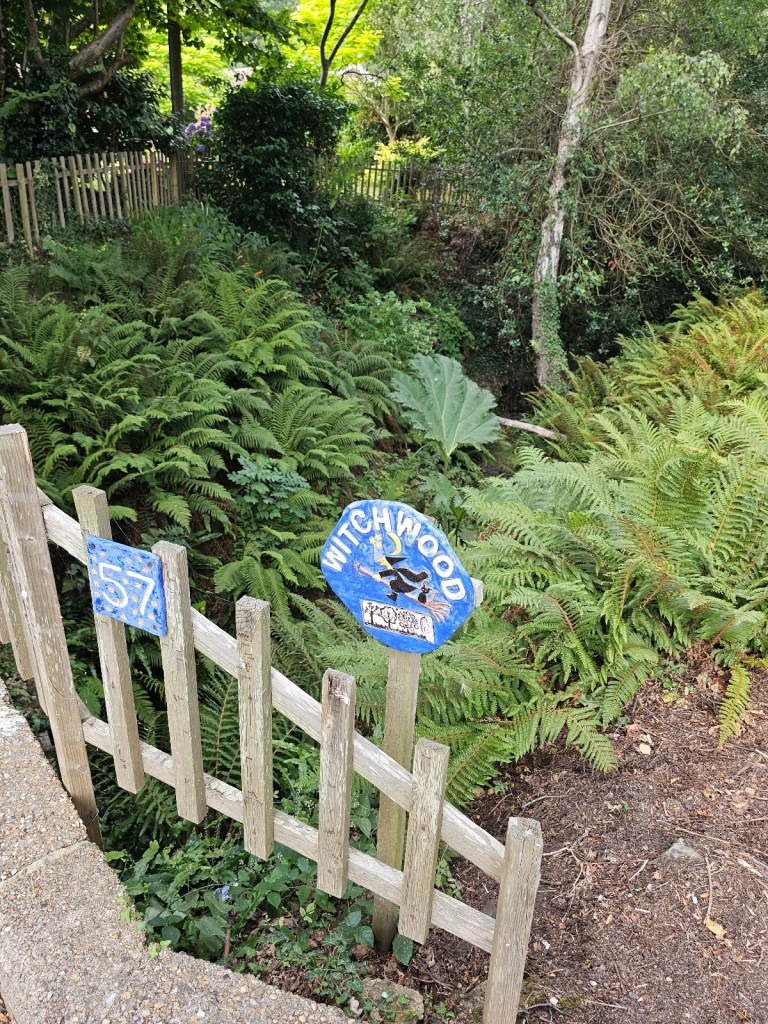 A sign in front of a house in Fairlights. The cottage is named Witchhood