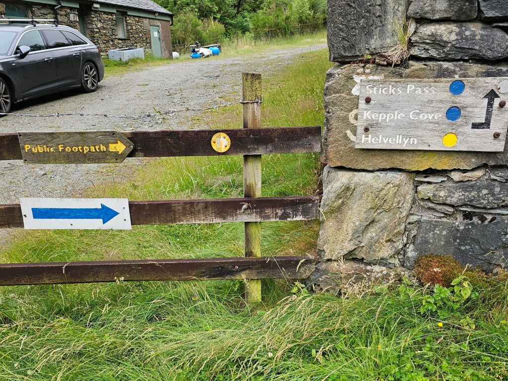 Signposts for Helvellyn summit
