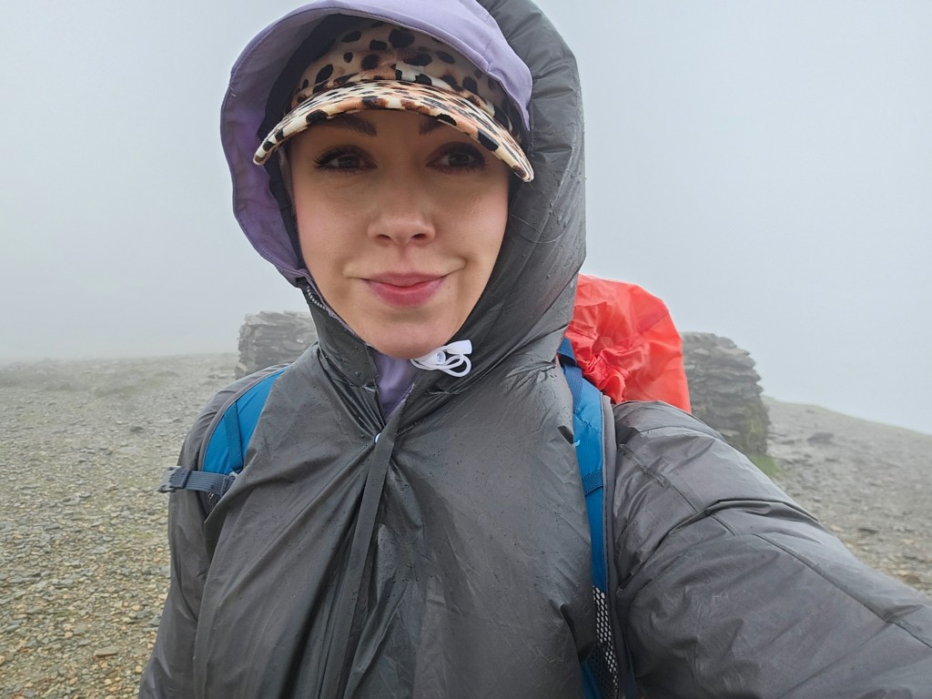 A selfie at the top of Helvellyn, Lake District. Dense fog can be seen in the back