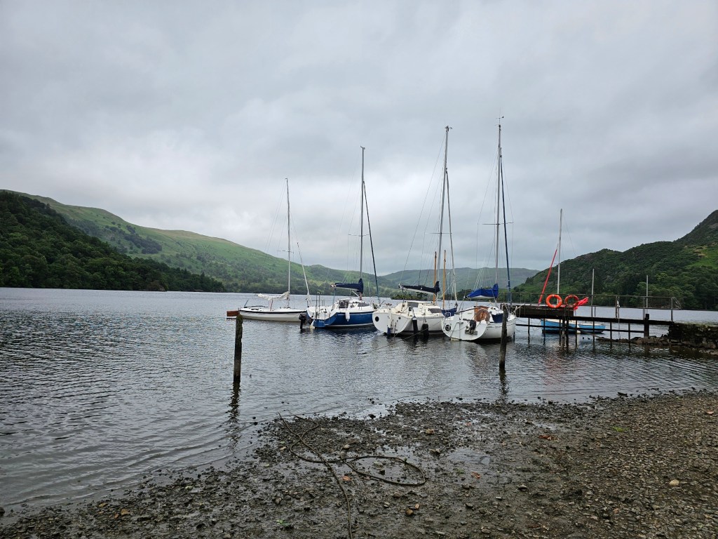 Boats on Ullswater lake in Lake District, England