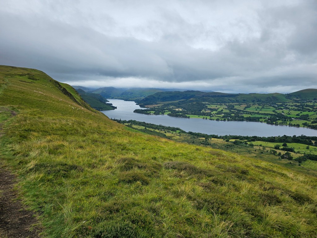 A long, narrow lake surrounded by hills