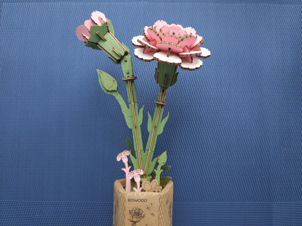 Finished wooden pink carnations flowers