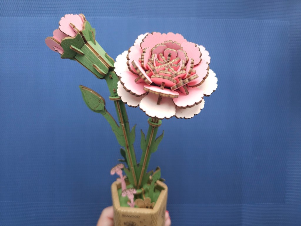 Finished wooden pink carnations flowers