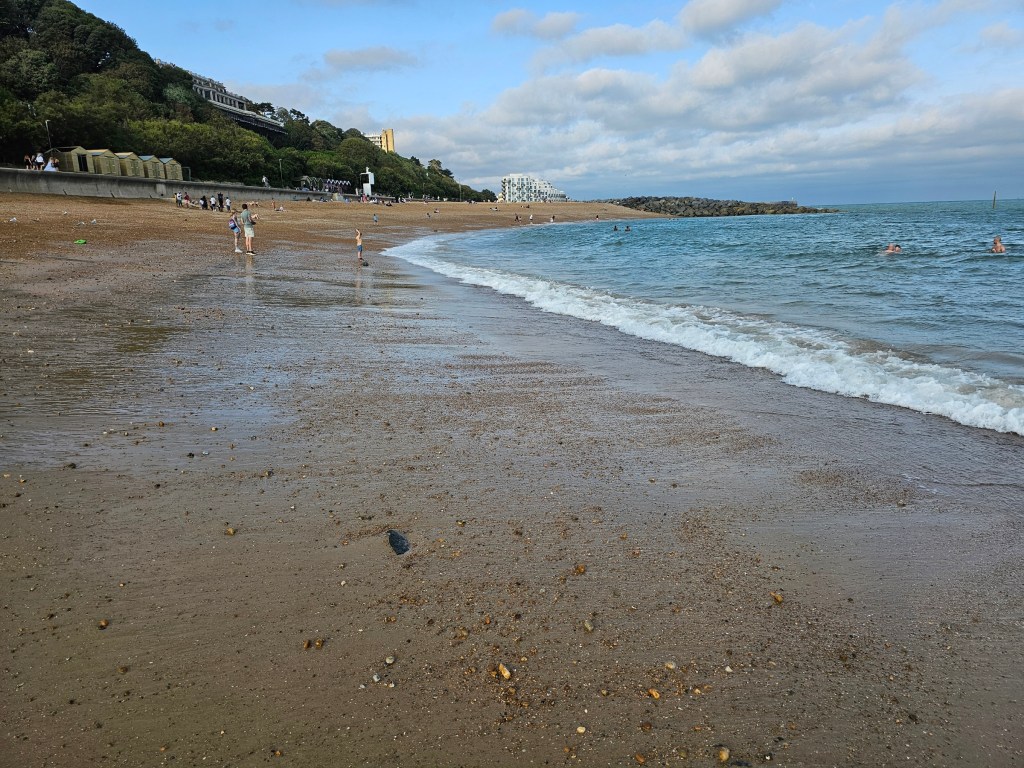 Sandy beach in Folkestone at low tide