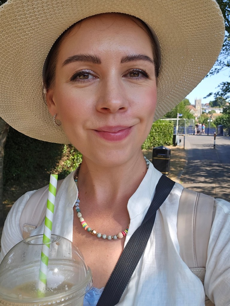 Selfie of a woman in a large sunhat