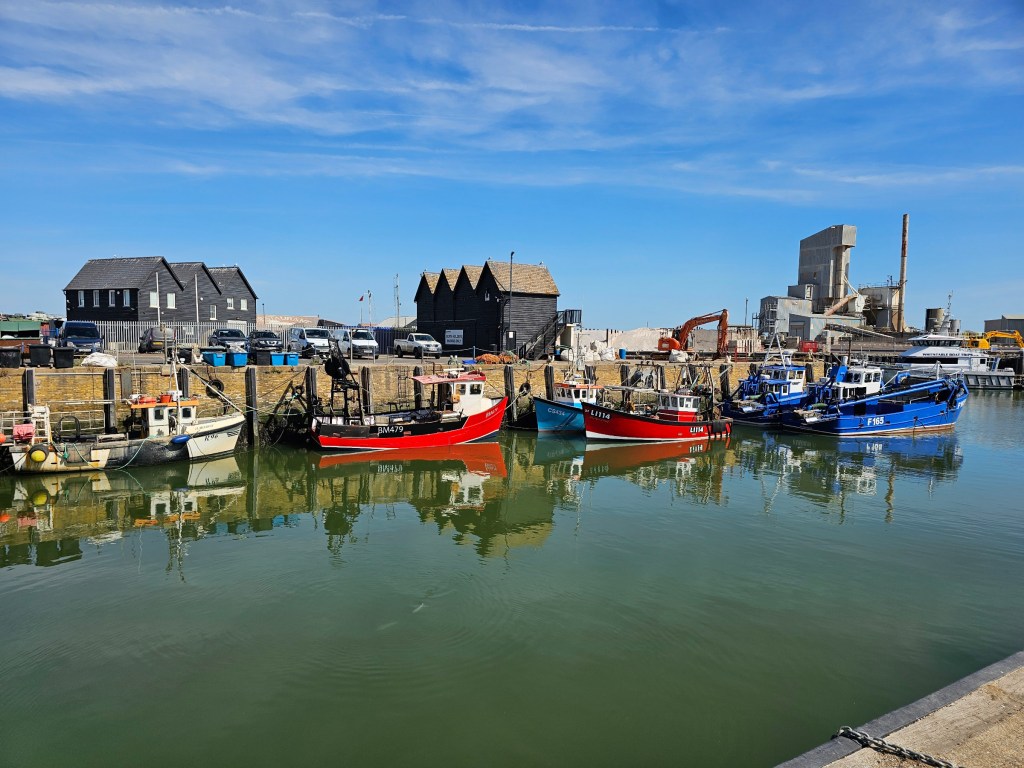 Boats in the harbour area of Whitstable