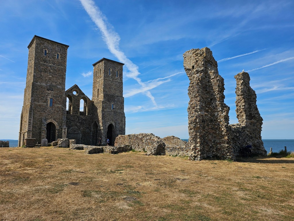 Ruins of Reculver Fort. Blue skies in the background.