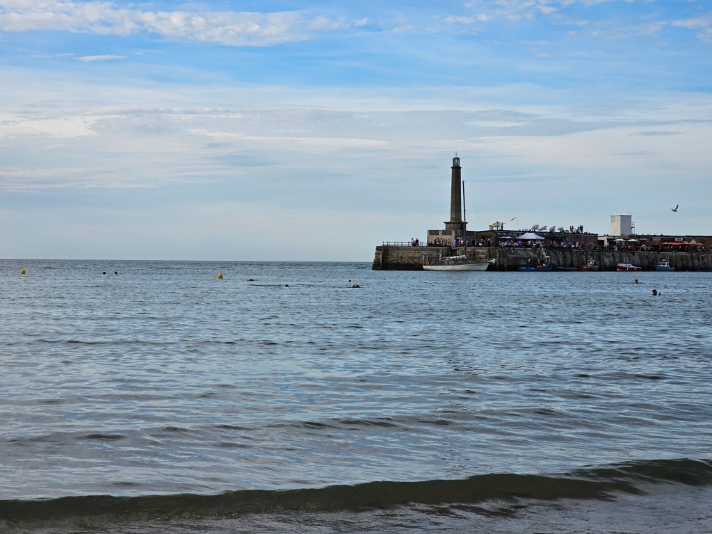 The lighthouse in Margate at the end of a harbour arm. Photo taken at high tide