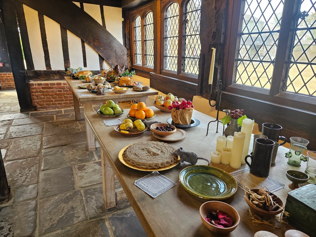 A table filled with food replicas in Queen Elizabeth's Hunting Lodge in Epping Forest