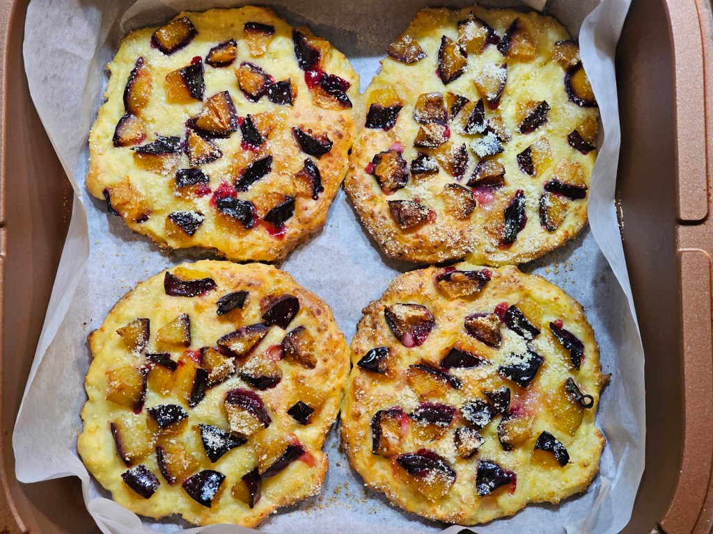 Four baked high protein plum pastries.