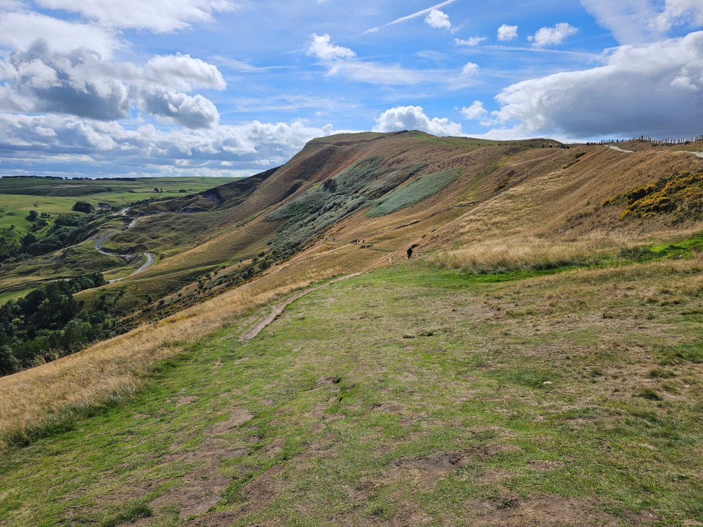 The peak of Mam Tor. Blue skies.
